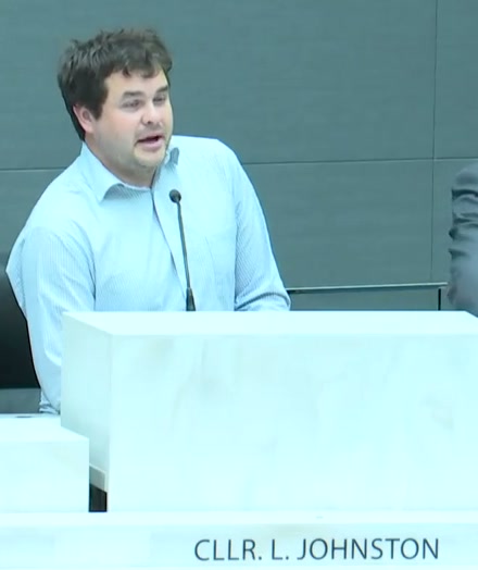 Councillor Landon Johnston speaking at a Calgary city council meeting